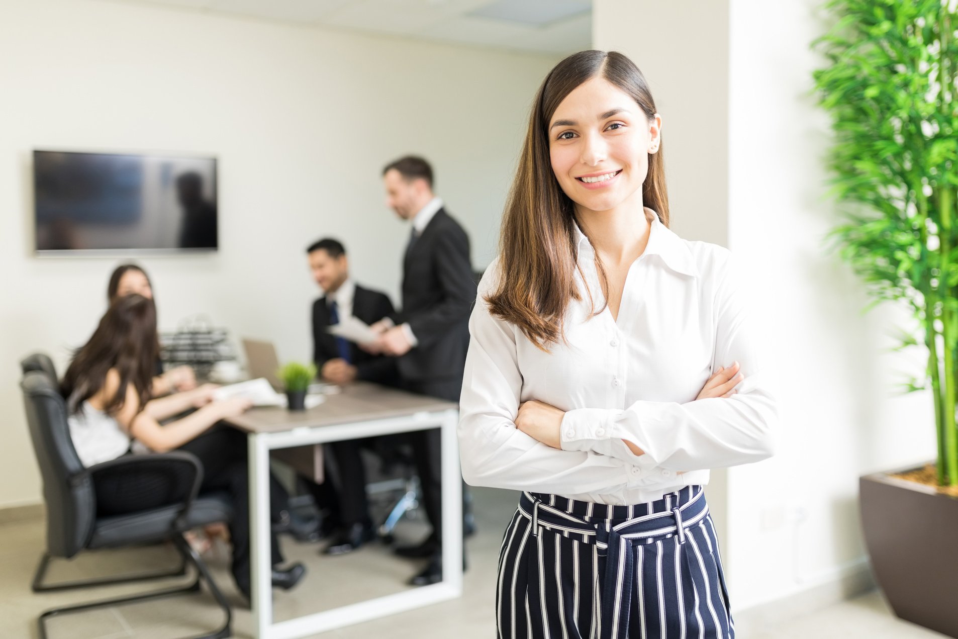 Company Owner Smiling In Office